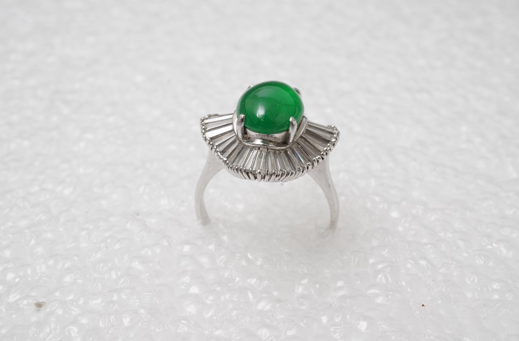 A fine jadeite and diamond ring